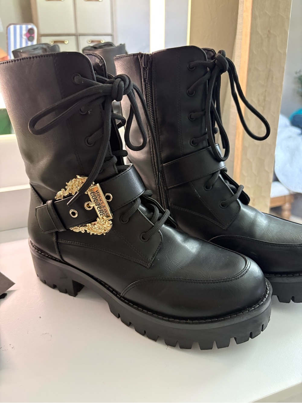 Women's Black Lace-Up Combat Boots with Gold Buckle Accent